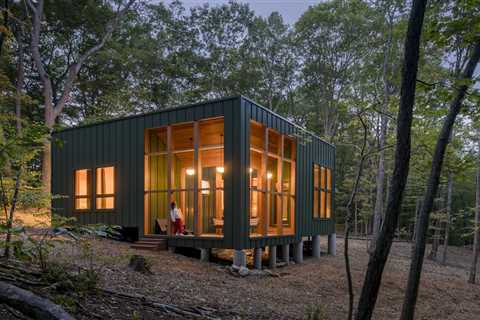 A Metal-Clad Cabin Hovers Above the Forest Floor in Connecticut