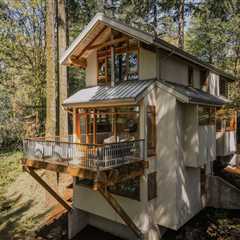 This $1.3M Portland Chalet Cantilevers Over a Wooded