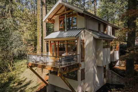 This $1.3M Portland Chalet Cantilevers Over a Wooded