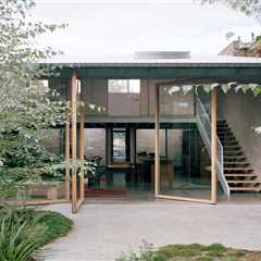Four Massive Pivot Doors Bring the Outdoors In at This Australian Family Home