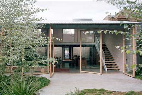 Four Massive Pivot Doors Bring the Outdoors In at This Australian Family Home